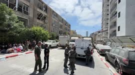 Israel: Rescue efforts continue after Iranian strikes kill at least 10 in central Israel