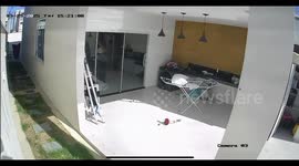 Woman Bolts Into Glass Door
