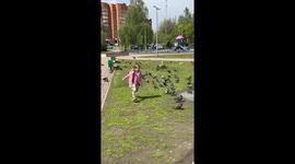 Little Girl Falls Into a Puddle