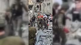 Israeli Rescue Teams Continue Search for Survivors After Iranian Night Strike