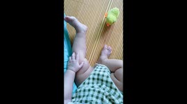 Baby's unexpected reaction to toy chick in Zhejiang, China