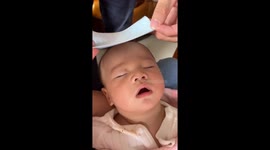 Baby spits water in surprise in Jiangxi, China