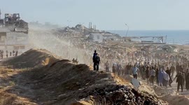 Palestinians flock to aid distribution point in Gaza’s Beit Lahia