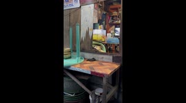 Waiting for dinner! Pet dog has hilarious look of boredom as he waits for food