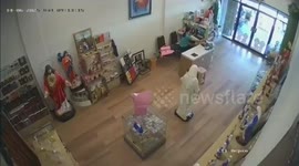 Out-of-control car crashes through Christian shop in Indonesia