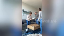 Daughter surprises her two mums with pregnancy reveal during Pride Month