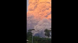 Ash cloud towers over homes as Mount Lewotobi volcano erupts