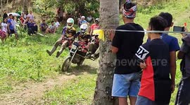 Motorcycle riders tackle wacky uphill course