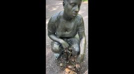 This bronze fountain in a Norwegian park has a very rude suprise