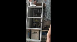 Clothes hanger spins down steps in Inner Mongolia, China