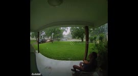Woman Takes Fall After Hurrying in From The Rain