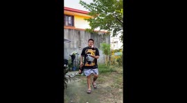Youngster shows off his awesome bar tender bottle juggling skills