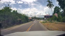 Taxi driver has a near miss when he pulls out in front of truck