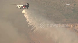 Brush fire spreads in the hills of California