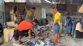 Massive python caught after eating chicken at construction site
