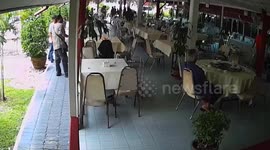 Thai man survives point-blank gunshot to the chest after bullet strikes lucky metal amulet