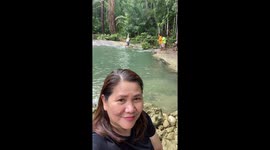Tourist recording selfie accidentally captures zip line fail behind her