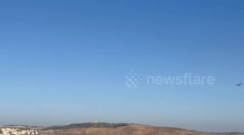 Israel: Iranian missiles seen over Jerusalem as sirens sound, explosions reported