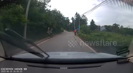 Dashcam captures child falling from bicycle in Hunan, China