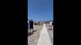 Woman falls from jet blast during plane takeoff in Skiathos, Greece