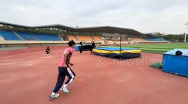 Man loses slipper mid-jump and lands it in metal bin in Qinghai, China