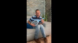 Uncle shocks himself playing electric fly swatter like a guitar in Caracas, Venezuela