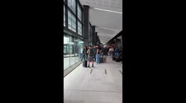 Dads Gather To Watch Airplane Tire Change