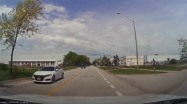 Collision With Flatbed Truck Backing Up Into Traffic