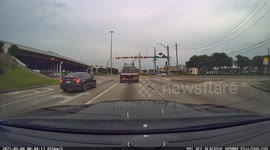 Van Runs Light At Beltway 8 On West Road