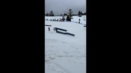 Skier and snowboarder ALMOST collide during rail jam competition
