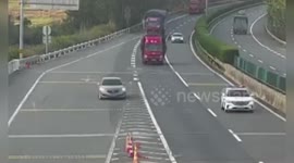 China: Truck Trying To Avoid Crash With One Car Crashes Into Another Injuring Three