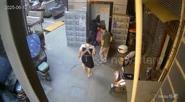Elderly man crashes through elevator door on tricycle and falls, fortunately survives without life-threatening injuries.
