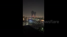 Iran: Air defense missiles and shots are fired and smoke rises from targets in west of Tehran June 14