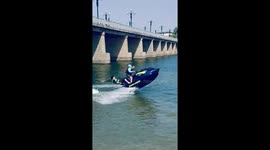 Holidaymaker nearly falls into sea as jetski suddenly accelerates during ride