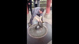 Chinese man lifts 182kg iron block at ghost town site