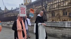UK Assisted Dying Bill: A monk sprinkles holy water around Parliament as groups for and against gather