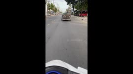 The motorcyclist was seen carrying several motorbikes on one motorbike.