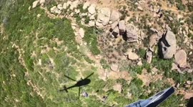 Crashed paraglider rescued by helicopter crew in California