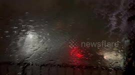 Couple get soaked, trying to record the severe thunderstorm in North Dakota early Saturday morning