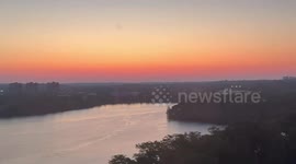 Summer Solstice Sunrise Over Fresh Pond, Seen from Cambridge Window