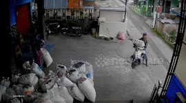 Motorcycle bursts into flames on street in Jakarta, Indonesia