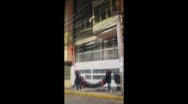 Cat rescued from overhead wire by firefighters in Cusco, Peru