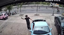 Car nearly hits bystander and crashes into motorcycle in Sichuan, China