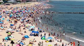 US: Extreme heat warning issued as New Yorkers flock to Coney Island Beach