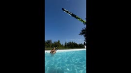 Tennis, but make it poolside—Summer showdown goes viral