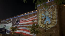 Israel: US, Israeli flags projected on Jerusalem’s Old City walls after Trump announces strikes on Iran