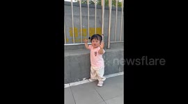 Crying girl's mood instantly lightens up as mother plays her favourite song