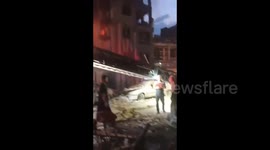 Iran: Firefighters are on the scene where a building has been demolished in Israel's attack on Tehran