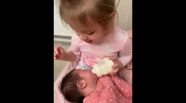 Blind Girl Feeling Her New Baby Sister