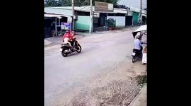 Security camera recorded the incident that took place on a road in Tien Giang province, Vietnam.